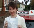 Vlad with Driving test pass certificate